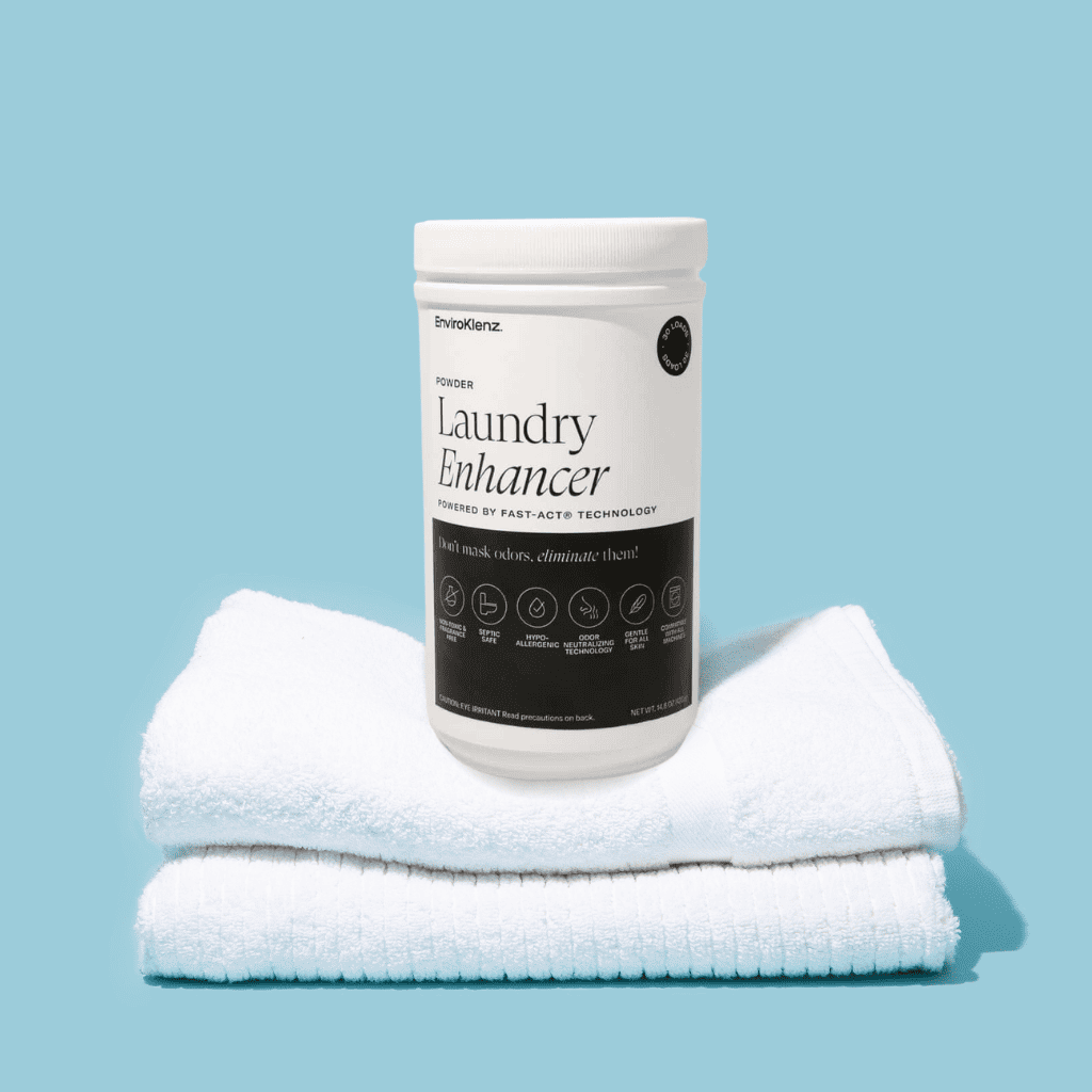 EnviroKlenz Laundry Enhancer Powder on top of white towels