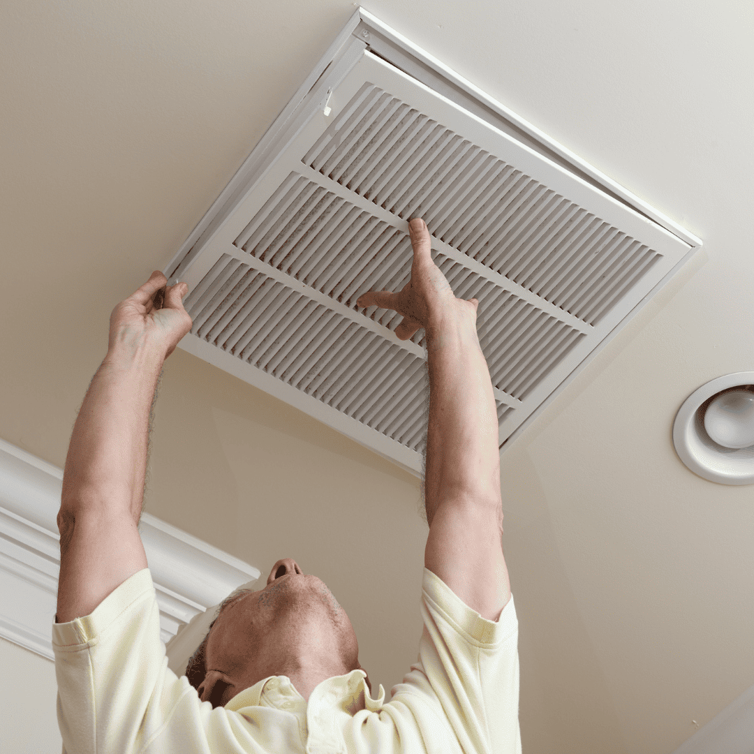 Male installing a EnviroKlenz HVAC Filter