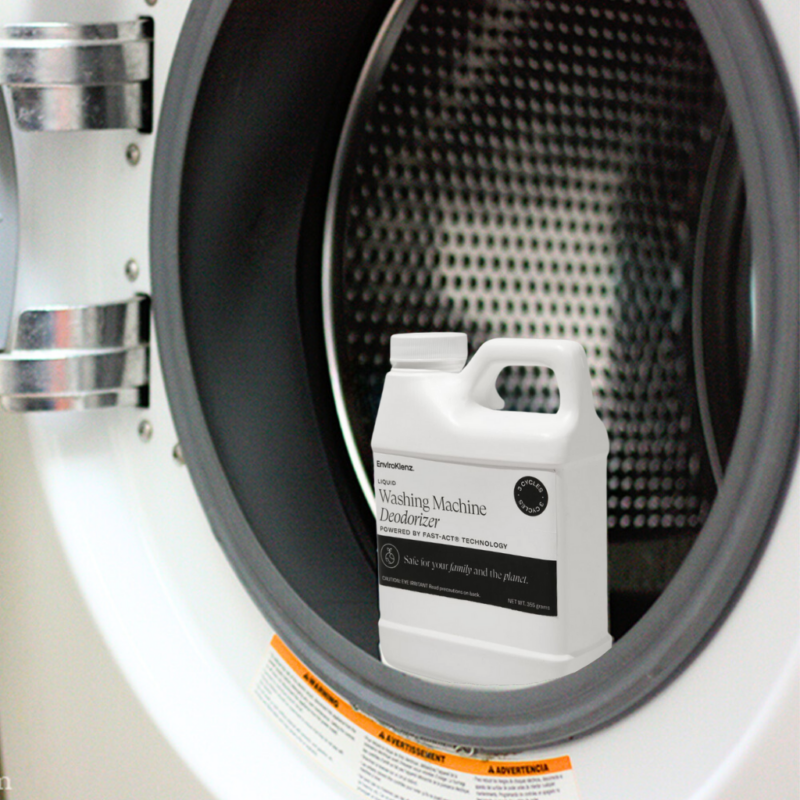 EnviroKlenz Washing Machine Deodorizer Bottle in a Washing Machine