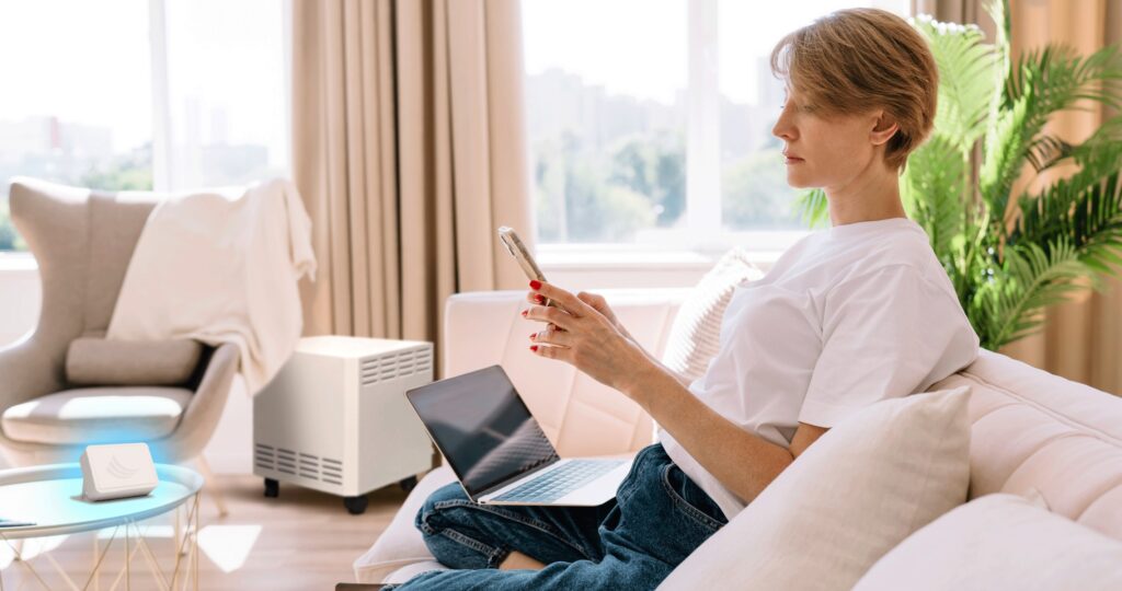 Woman using the EnviroKlenz SMART Science™ ECO Kit in her home