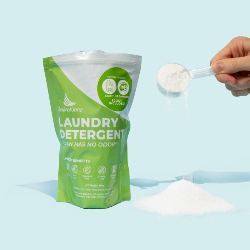 EnviroKlenz Laundry Detergent Powder With a Spoon Full of the Powder